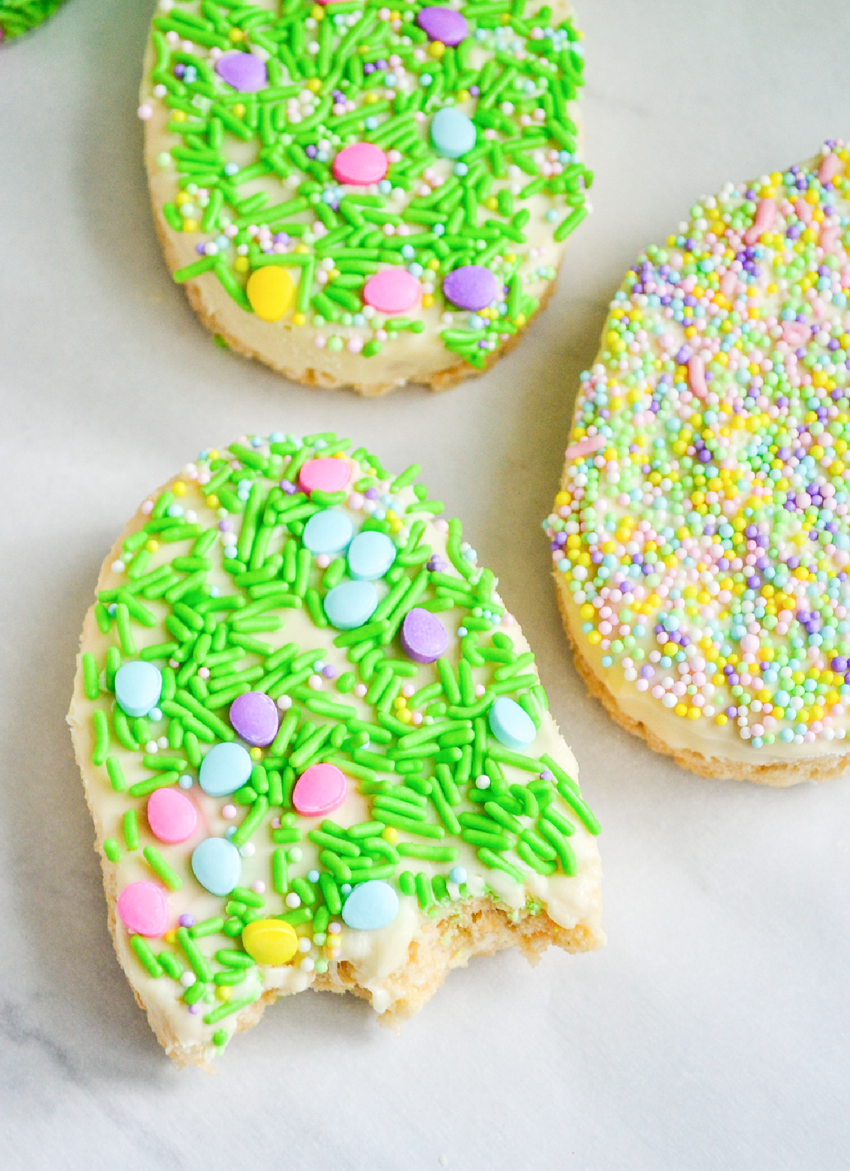 Decorated Easter Egg Rice Krispie Treats with bite missing